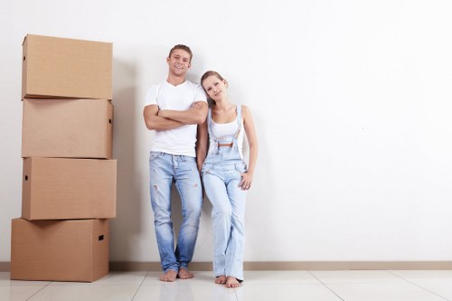 Professional removals team planning a move in Battersea street