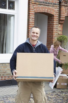Stacked moving boxes and packing supplies for Battersea relocations