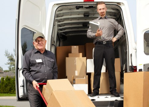 House removals team planning a move in Battersea street