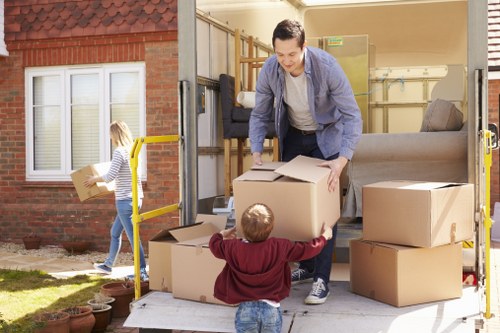 Removal van loading furniture during Battersea house move