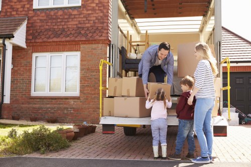 Moving team preparing boxes and furniture safely before a relocation