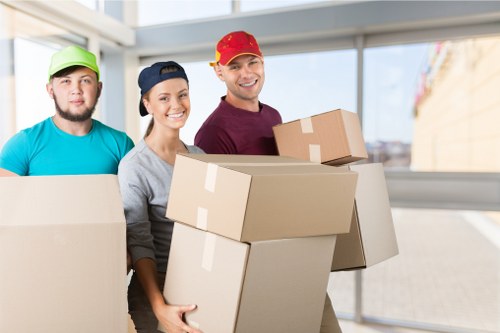 Office relocation planning in Battersea with moving boxes and workspace setup
