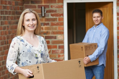 Moving boxes with a van in Battersea residential area