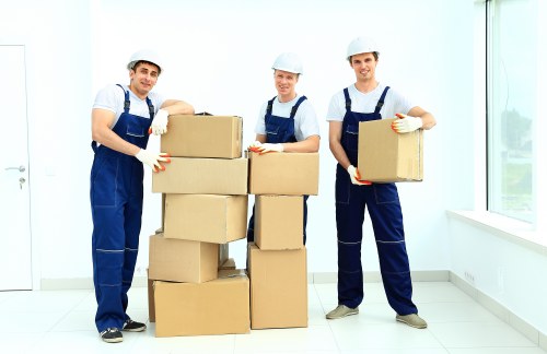 Professional Battersea movers packing boxes and furniture carefully