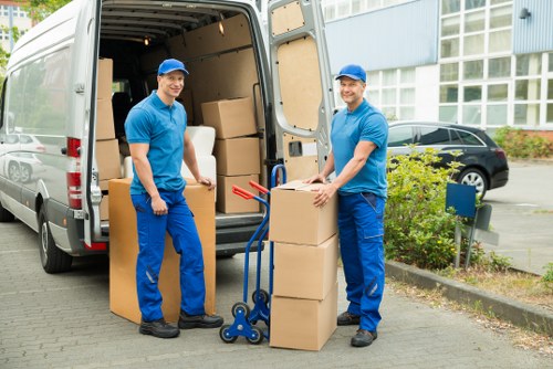 Battersea movers handling furniture and boxes with care