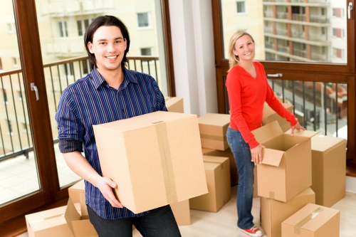 Moving crew confirming service details with a customer