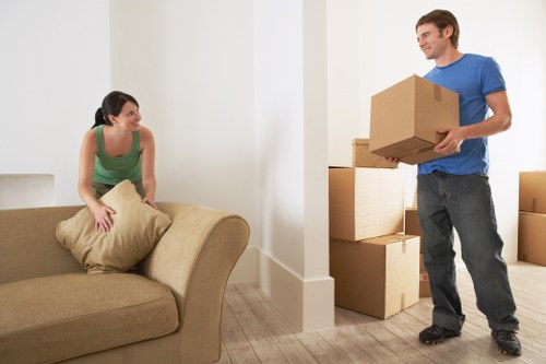 Experienced movers preparing furniture for relocation in Battersea